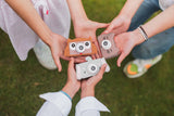 odalmix of owl, cat and elephant kids digital cameras, kids holding the cameras in their hands