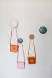 odalsilicon bags fox, unicorn and bear, hanging at coat rack